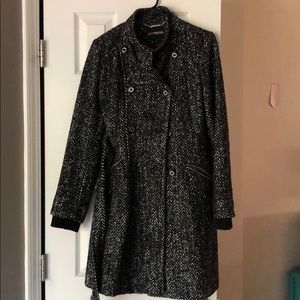 Heavy black and white marled fabric winter coat.